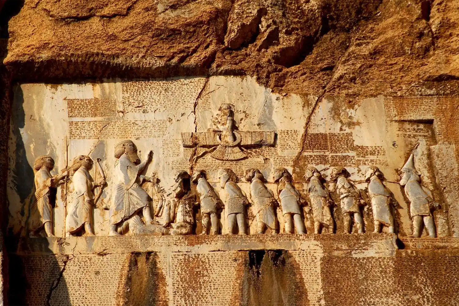 Bisotun Inscription: The world’s largest cuneiform inscription telling the story of Darius’ victory over his enemies. This UNESCO site features a stunning winged statue and a water spring nearby, located 38 km from Kermanshah (about 40 minutes).