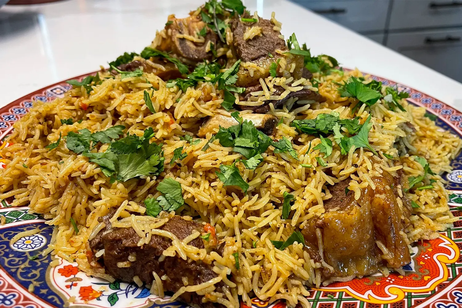Dampokht Goosht – Rice with meat, dates, and spices.