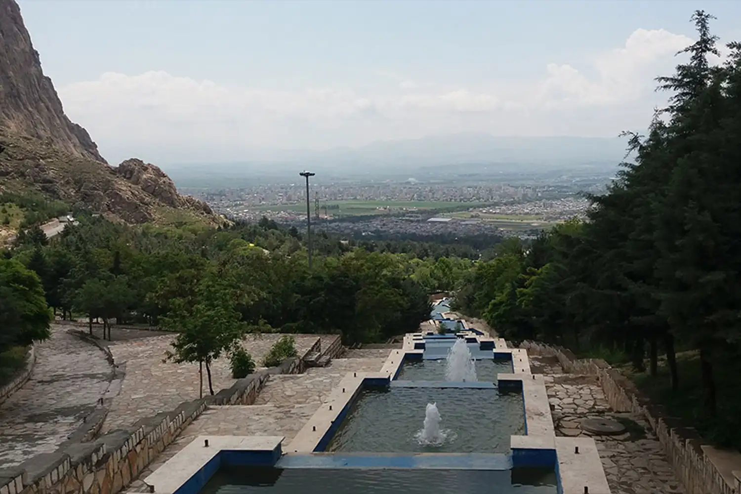 Kuhestan Park: A large park in Kermanshah, featuring a waterfall and green space.