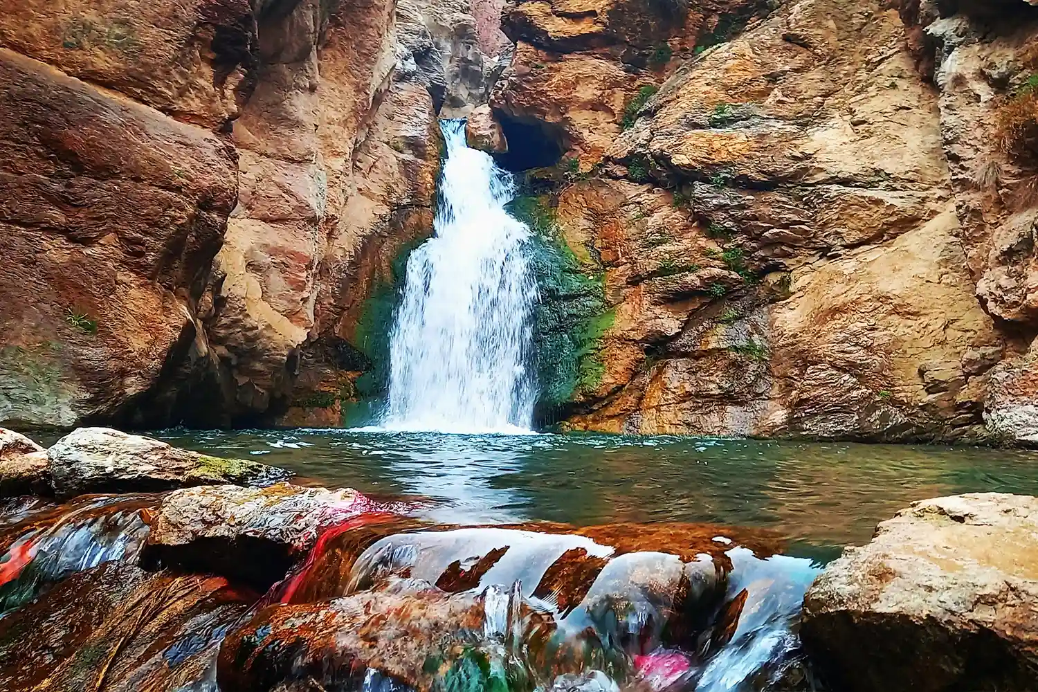 Sahneh Spring: A lovely spring near Sahneh town, known for its cool water and green surroundings.