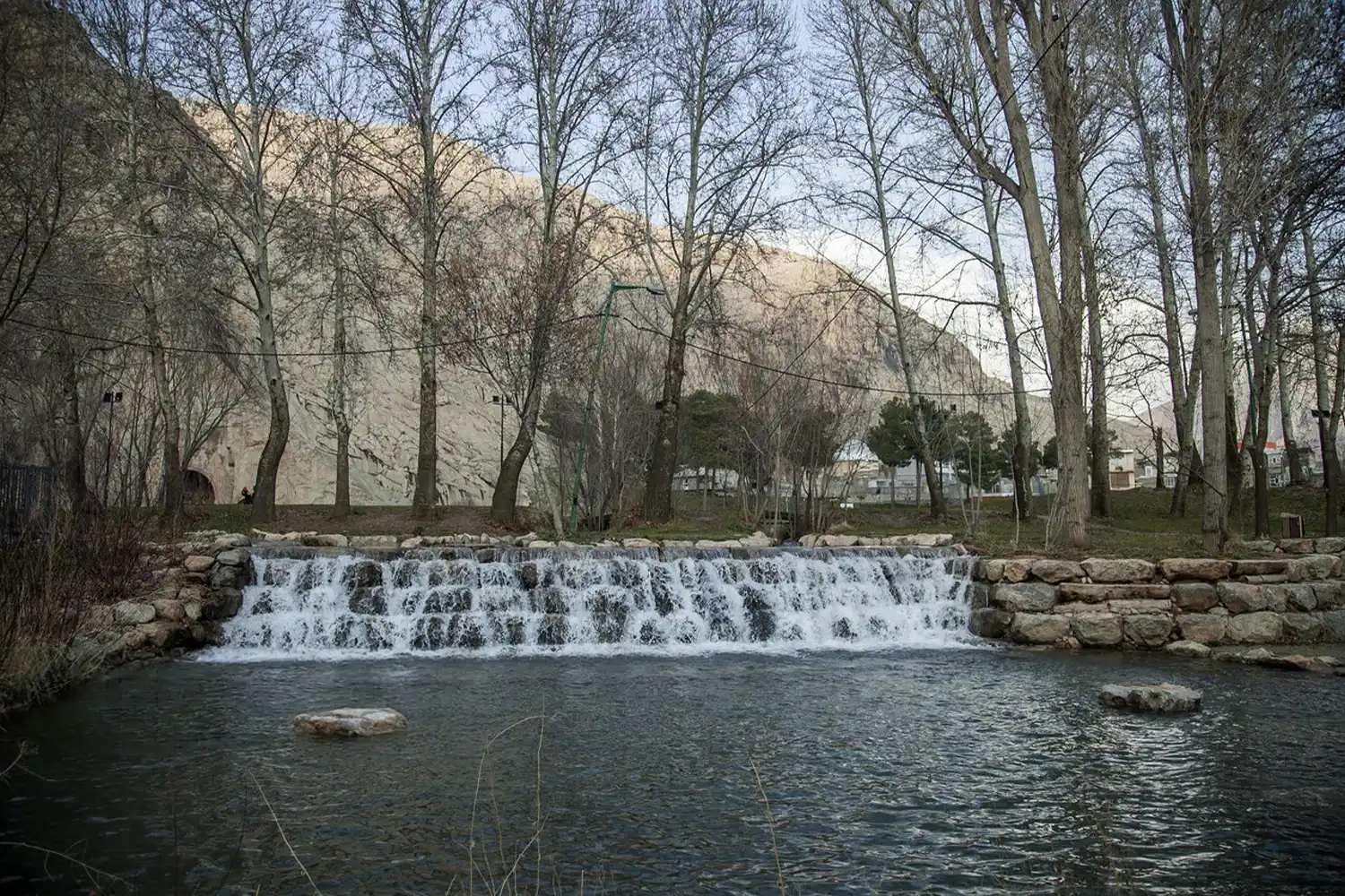Taq-e Bostan: A stunning collection of Sassanid-era rock carvings depicting royal hunting scenes and the coronation of kings, taking you on a journey through time.