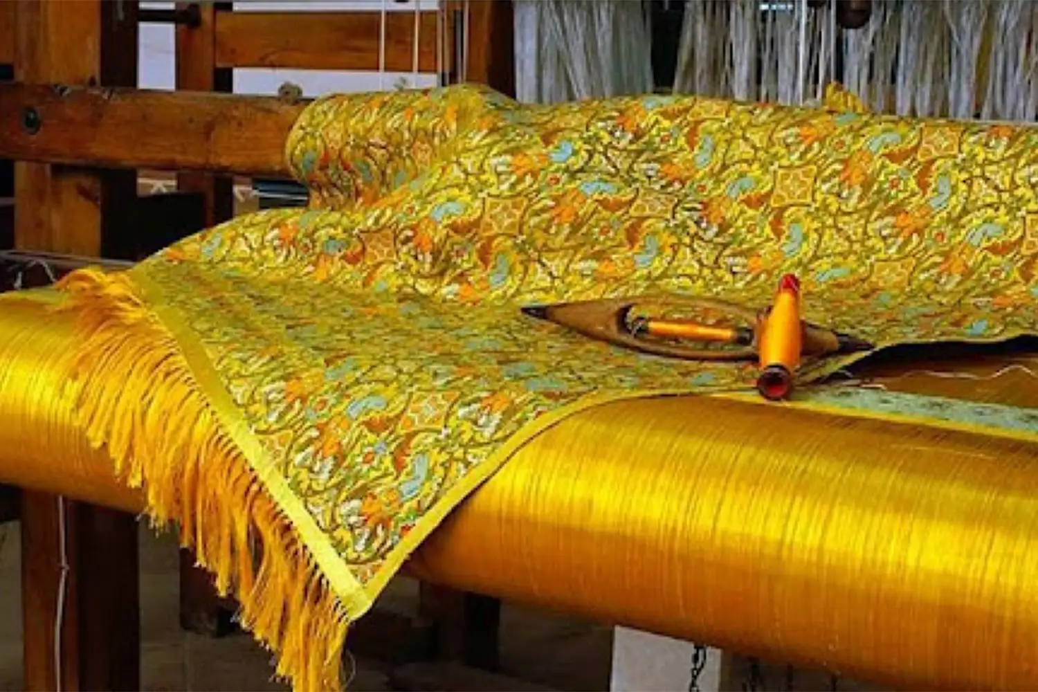 Zari Bafi (traditional gold/silver brocade weaving)